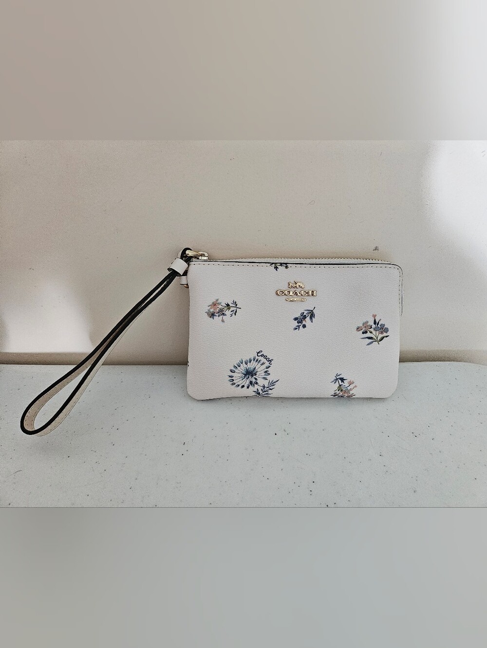 COACH White Floral Wristlet Clutch with Gold Logo